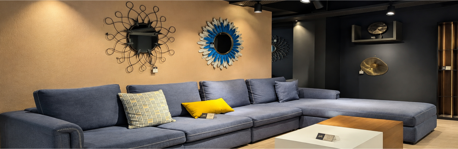 Light-filled living room with a cream sofa and patterned rug